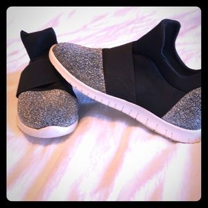 Women’s black and silver sneakers